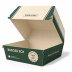 An open cardboard burger box with a hinged lid, shown on a white background. The exterior is dark green with cream text and stripe accents, and the interior is a natural beige cardboard color.