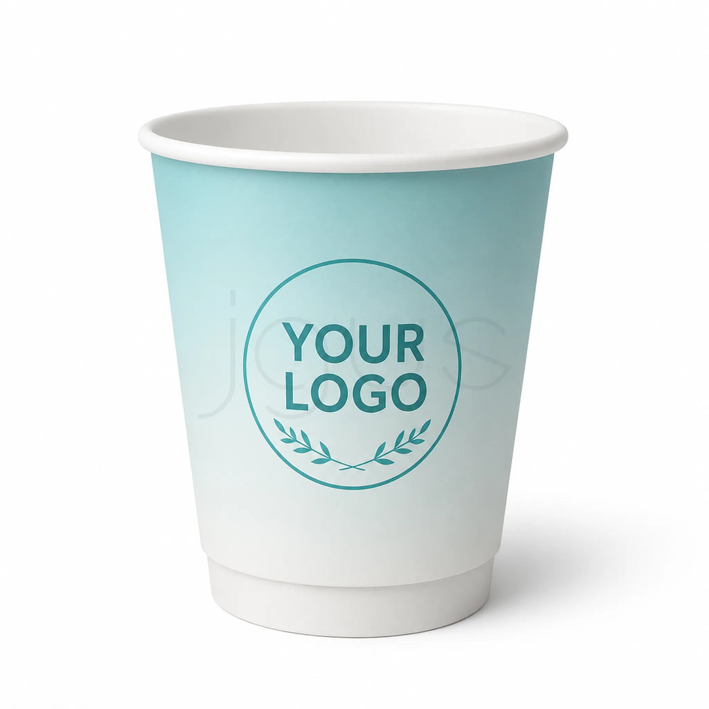 A white paper coffee cup with a light blue gradient on the outside, featuring a teal circular logo placeholder with the text 'YOUR LOGO' and leaf details, set against a plain white background.