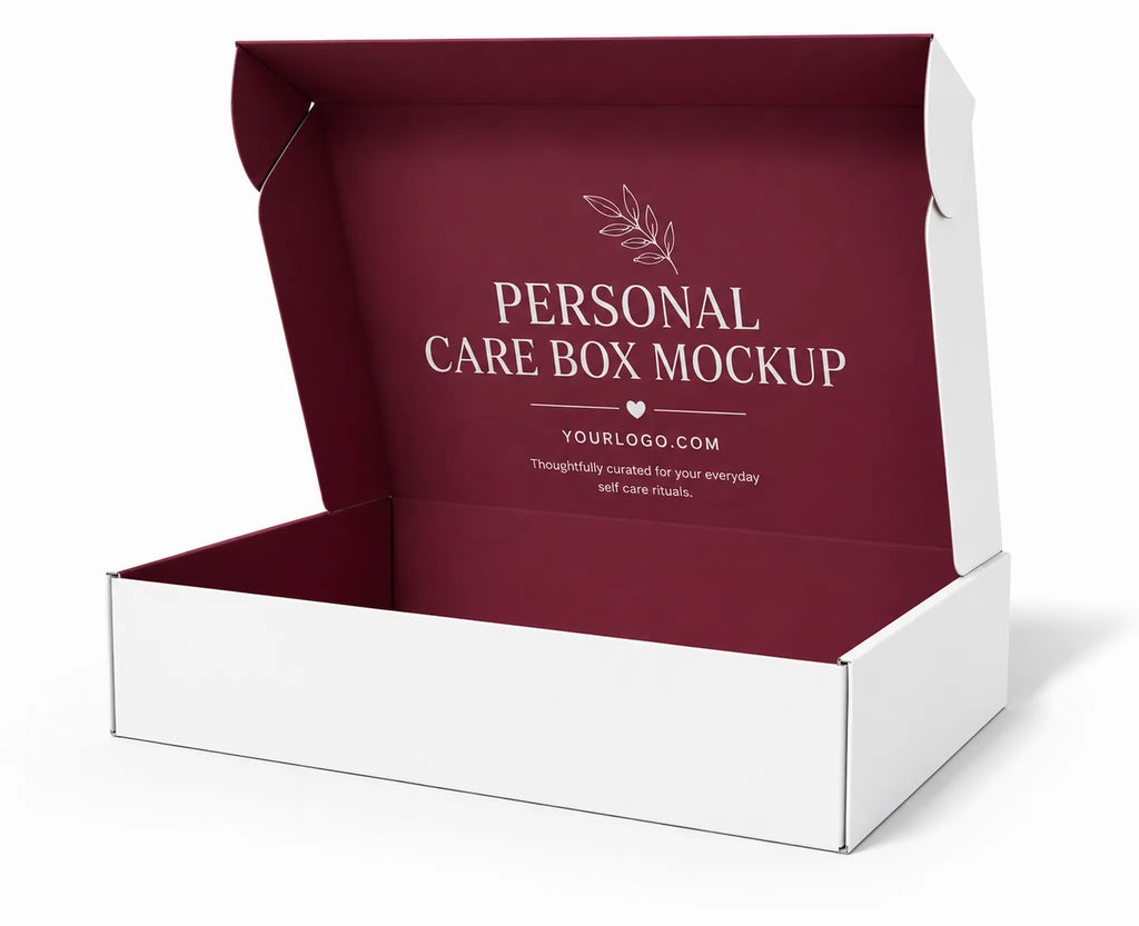 An open white cardboard gift box with a deep burgundy interior, shown on a clean white background. The inside lid features a placeholder logo and the text 'PERSONAL CARE BOX MOCKUP'.