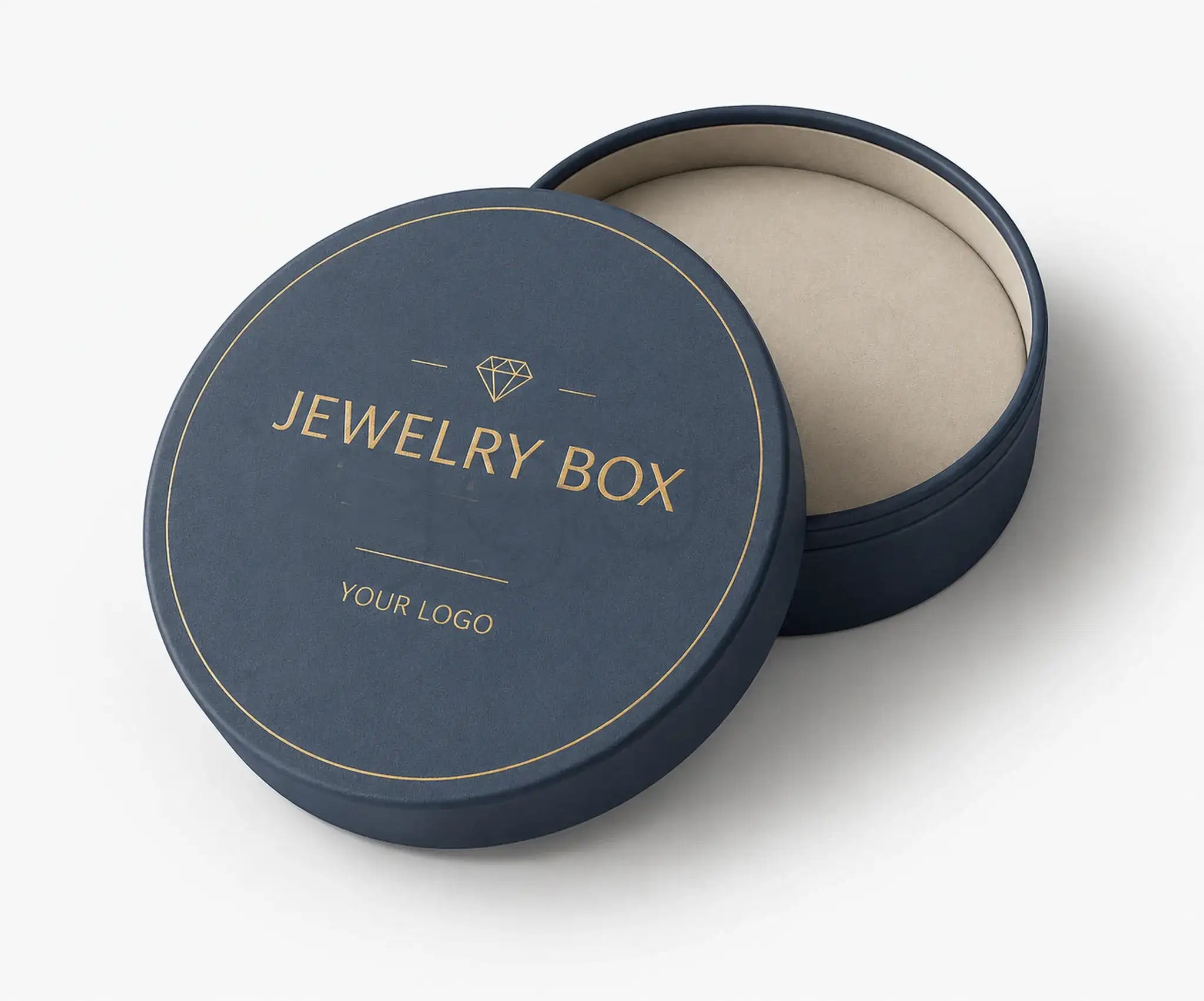 A round navy blue jewelry box shown open, with the lid in front displaying gold text that reads 'JEWELRY BOX' and 'YOUR LOGO,' plus a small diamond icon. The inside lid is a warm beige tone.