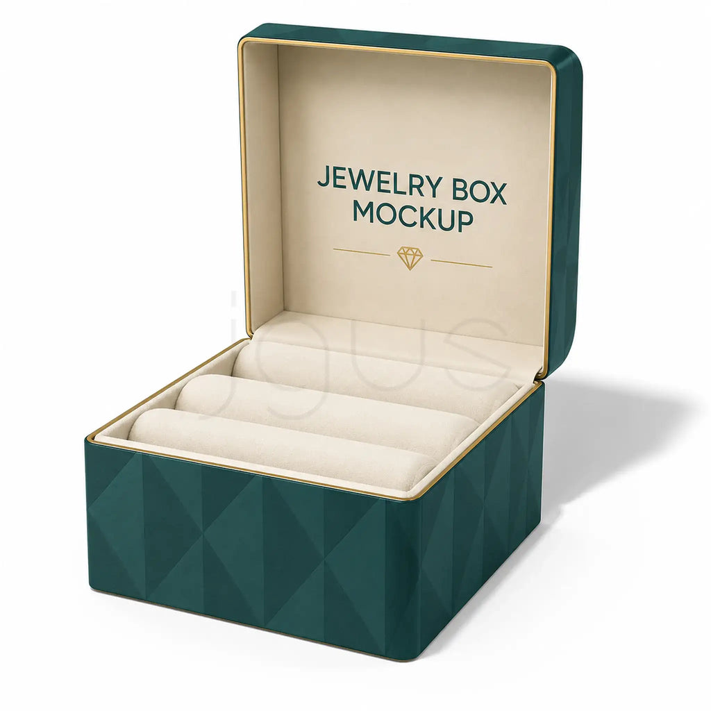 An open jewelry box mockup with a dark teal exterior, geometric pattern, and cream interior lining. The inside lid reads 'JEWELRY BOX MOCKUP' with a small diamond icon.