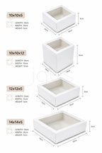 White cake boxes with window and dimensions labeled on a white background