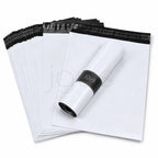 Stack of white mailing envelopes with black grey inside and adhesive for sealing