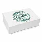 A white rectangular gift box with a green 'Happy Onam' decorative illustration printed on the lid, shown on a clean white background.